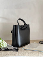 Borsa tote media in pelle intrecciata con dettagli a nodo