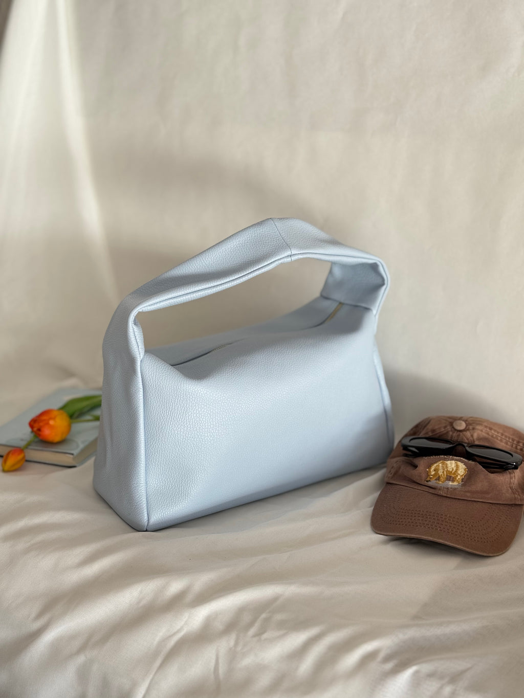 Borsa a spalla effetto “puff” in tonalità macaron