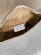 Borsa a spalla effetto “puff” in tonalità macaron