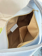 Borsa a spalla effetto “puff” in tonalità macaron
