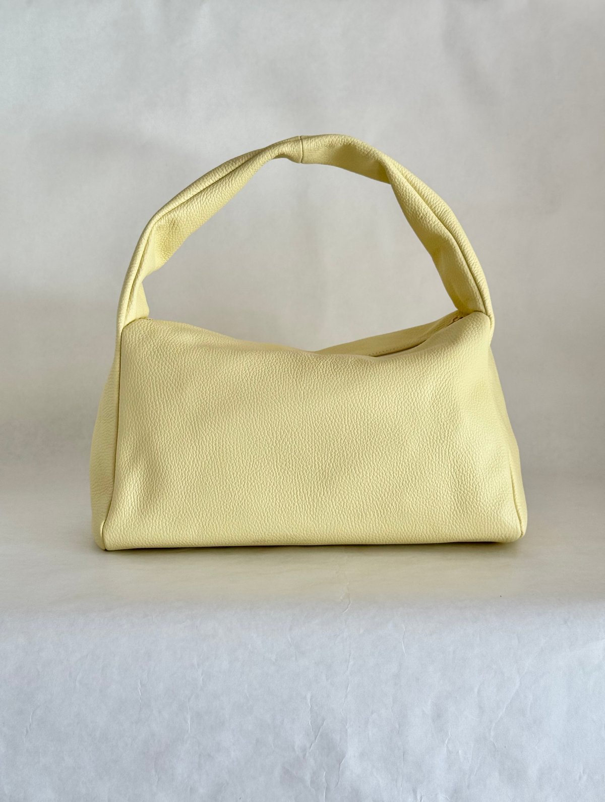 Borsa a spalla effetto “puff” in tonalità macaron