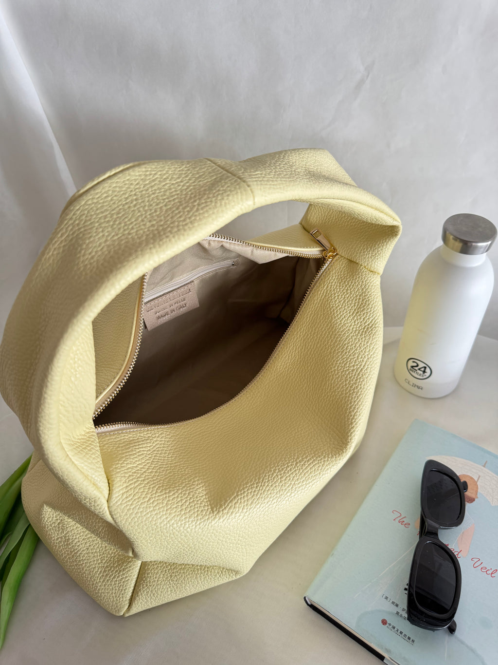Borsa a spalla effetto “puff” in tonalità macaron