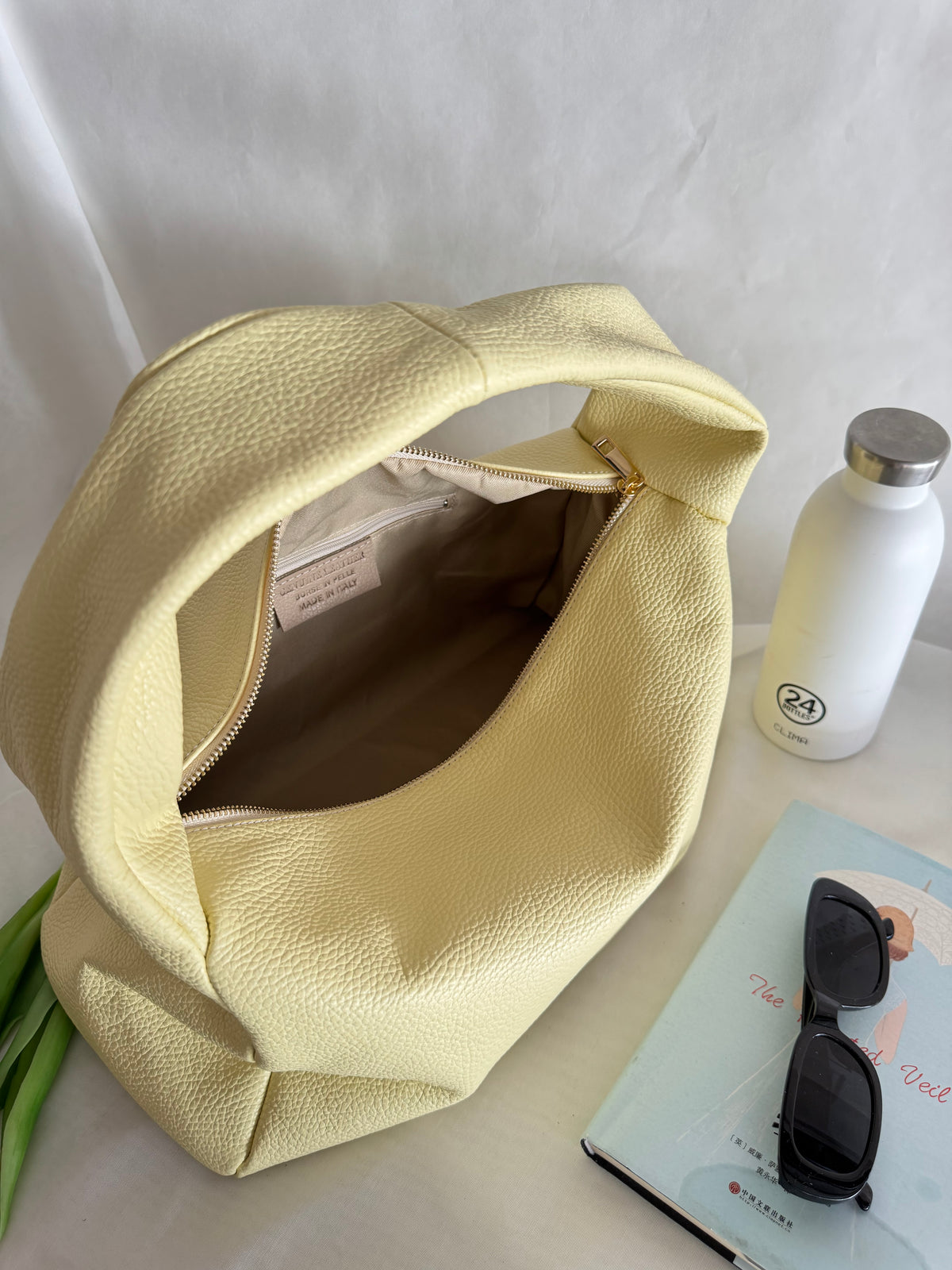 Borsa a spalla effetto “puff” in tonalità macaron