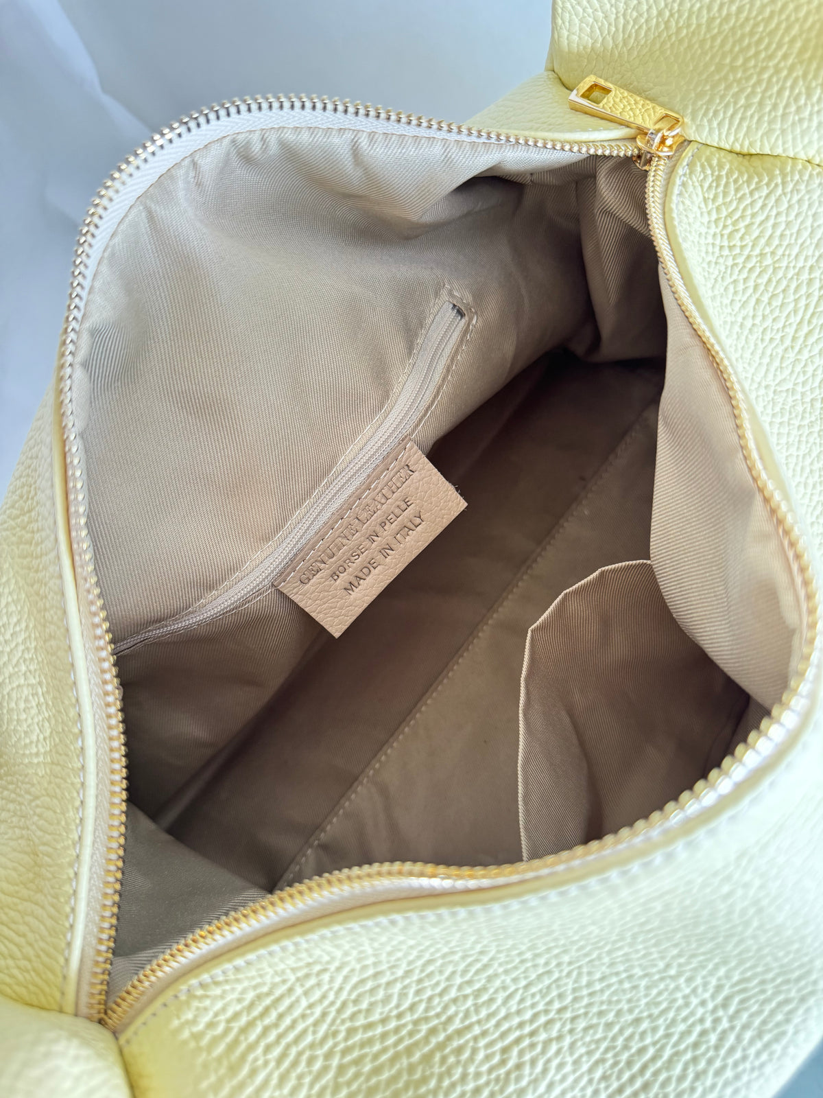 Borsa a spalla effetto “puff” in tonalità macaron
