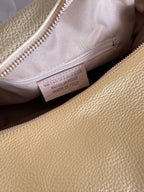 Borsa a spalla effetto “puff” in tonalità macaron