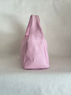 Borsa a spalla effetto “puff” in tonalità macaron