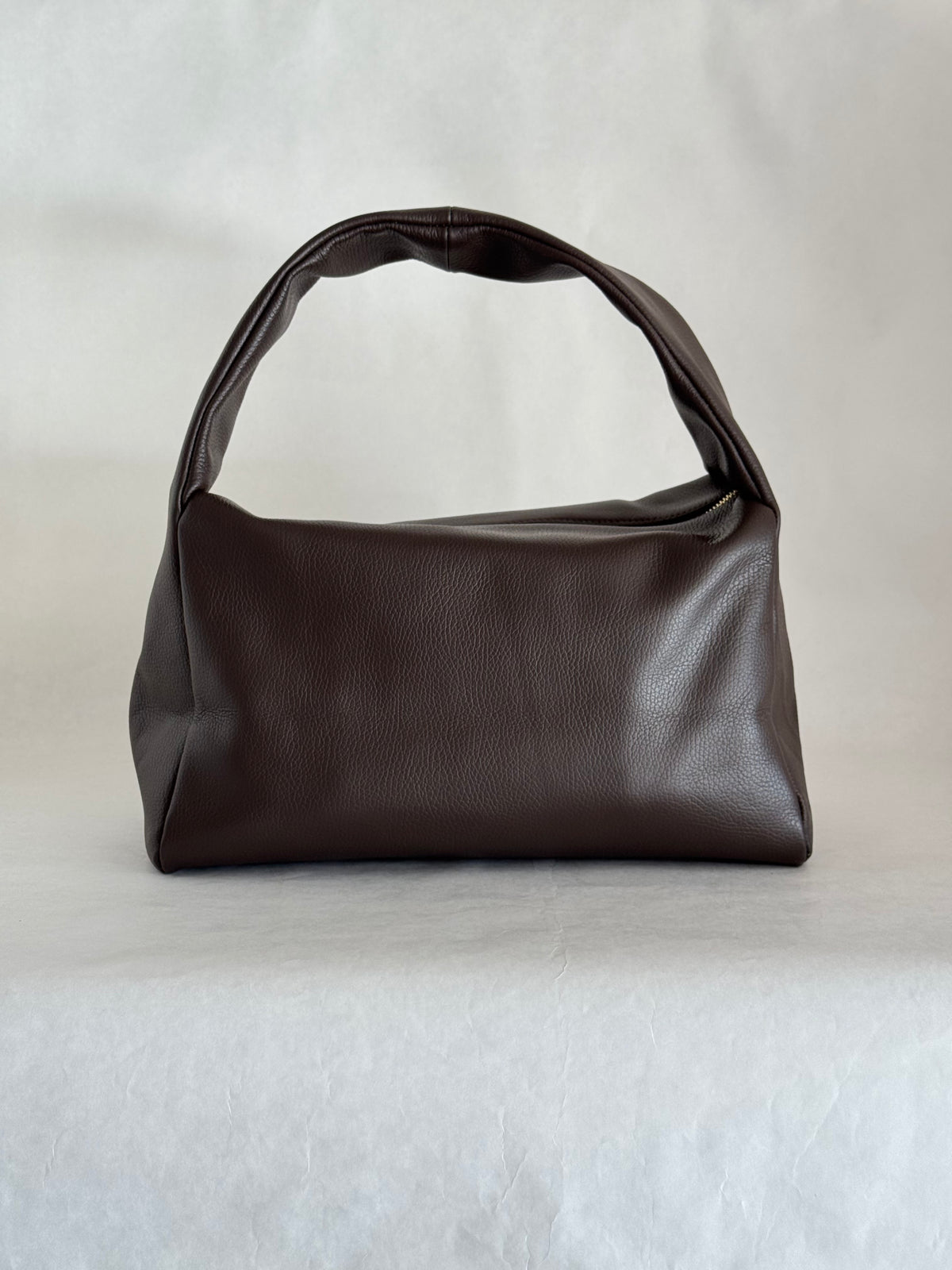 Borsa a spalla effetto “puff” in tonalità macaron