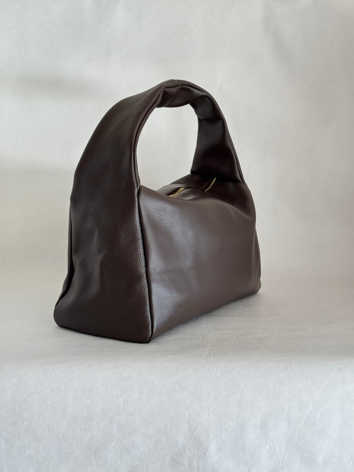 Borsa a spalla effetto “puff” in tonalità macaron