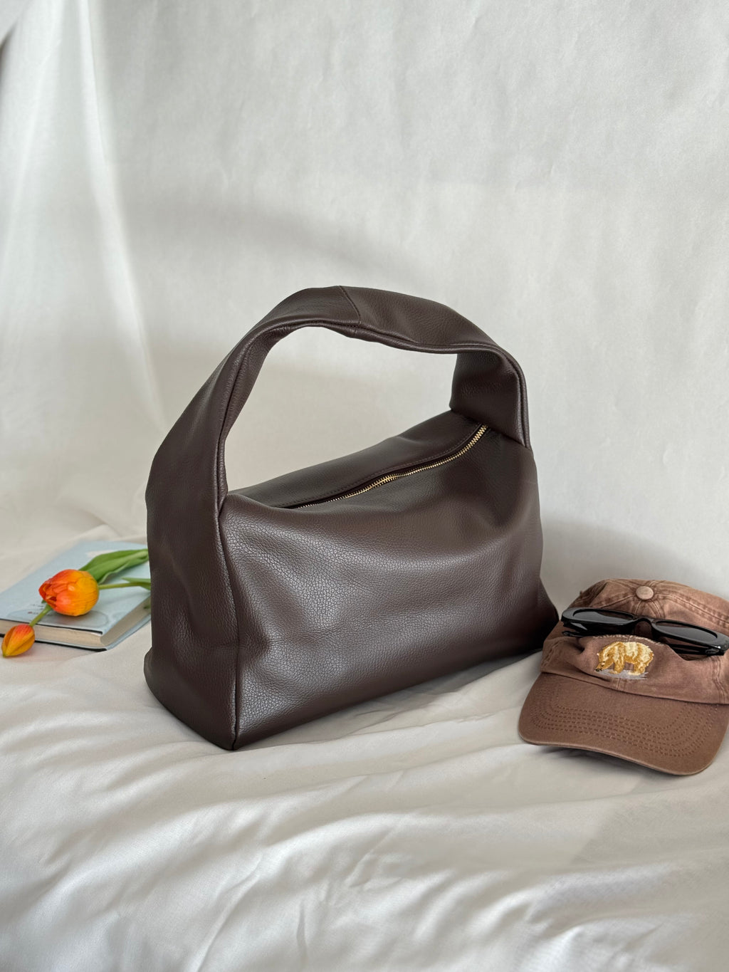 Borsa a spalla effetto “puff” in tonalità macaron