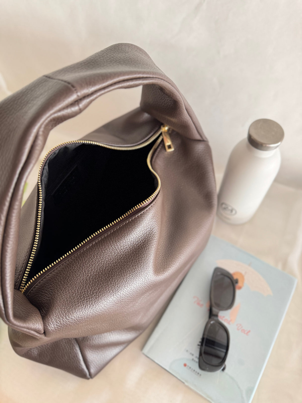 Borsa a spalla effetto “puff” in tonalità macaron