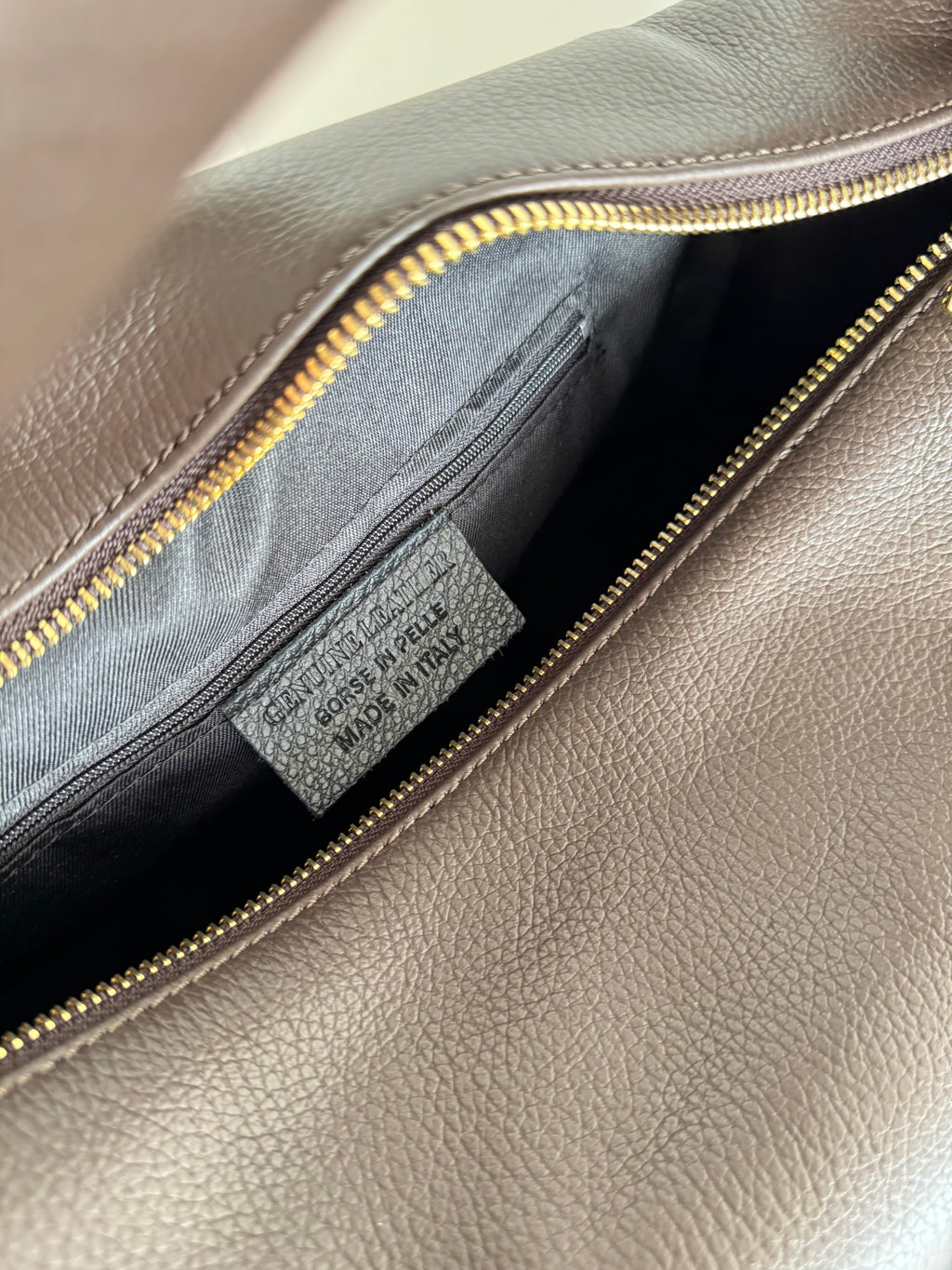 Borsa a spalla effetto “puff” in tonalità macaron