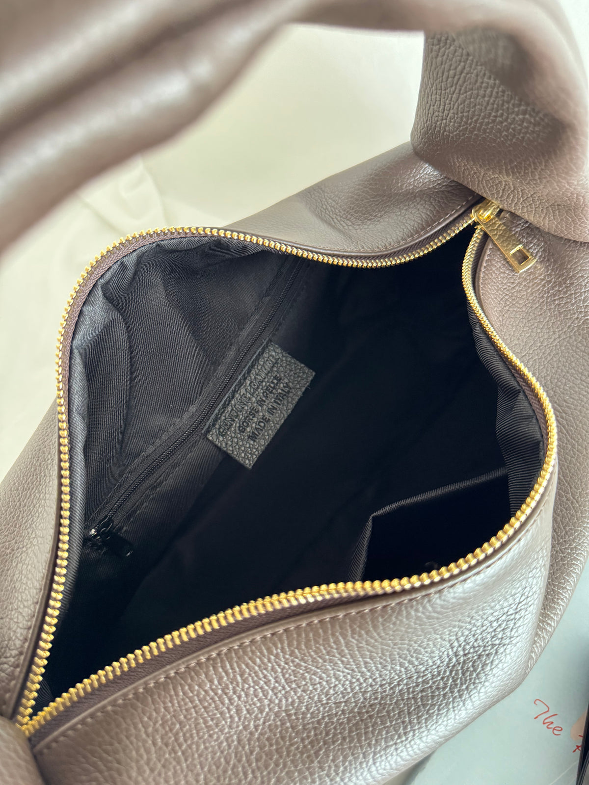 Borsa a spalla effetto “puff” in tonalità macaron