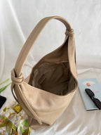Borsa hobo grande in pelle color kaki con dettagli a doppio nodo