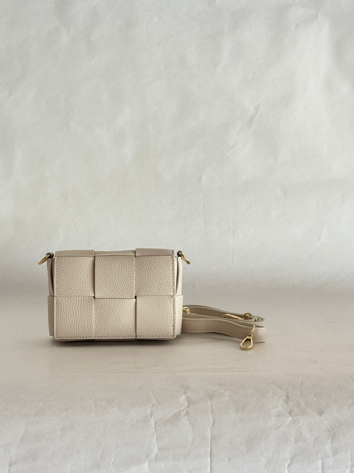 Mini borsa a tracolla in pelle intrecciata