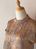 Completo donna con top jacquard floreale e gonna midi satinata